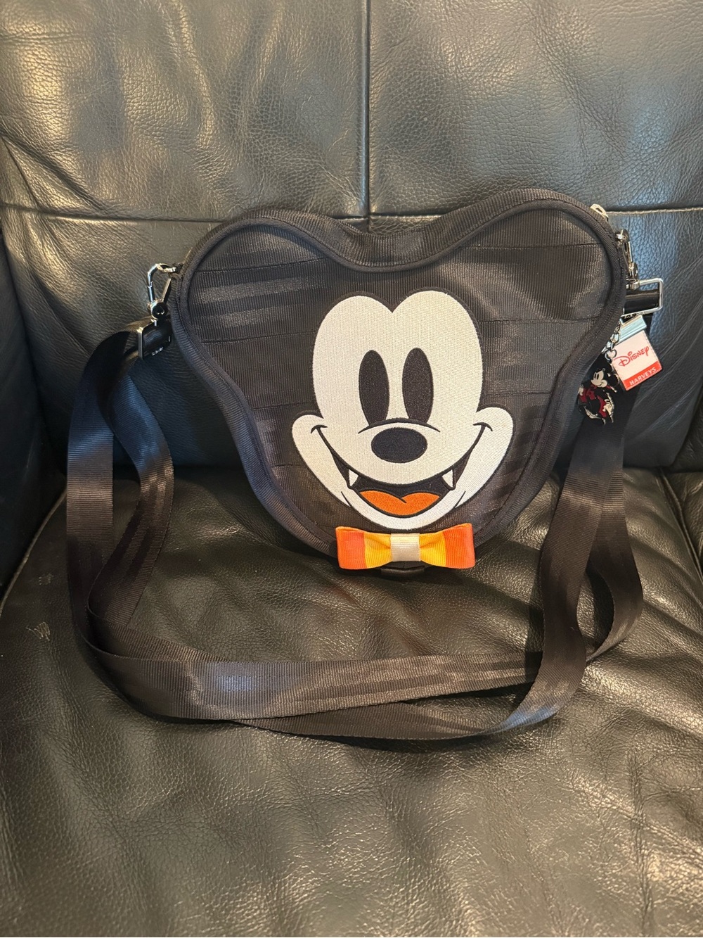 Disney x Harvey’s Vampire Mickey Mouse Face Messenger Bag with candy corn Bow
